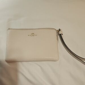 Coach White Clutch Elegant and Versatile